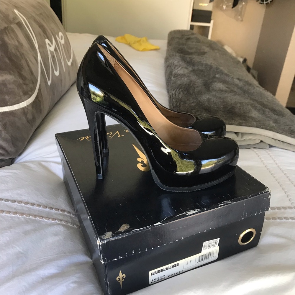 Black platform pumps.